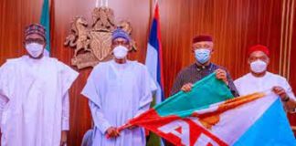 Buhari presents party flag to Anambra deputy gov as he defects to APC